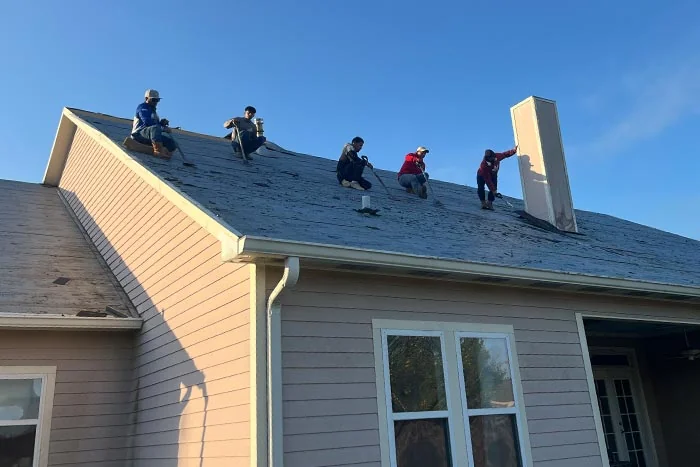The Daigle crew working on a roof deck